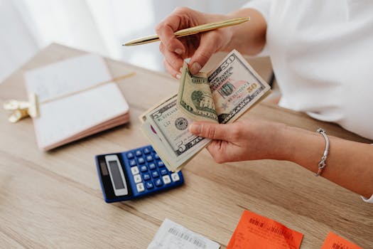 Calculator and budget planner on a desk