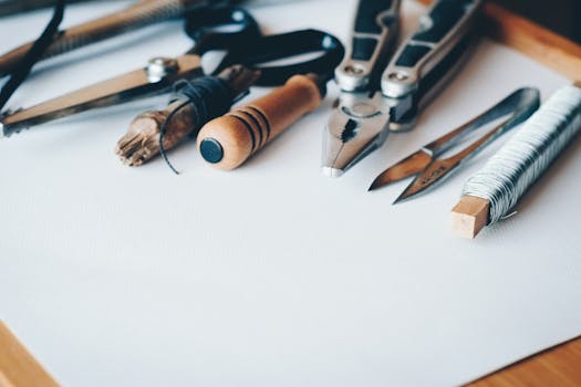 desk with creative tools and tax forms